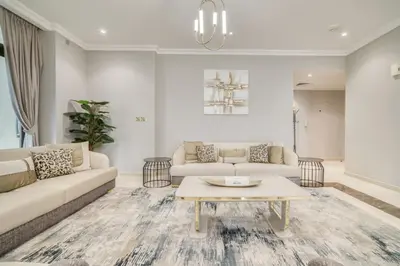 a living room with a couch and a coffee table at Hospitality Expert Rimal 5BR Marina Beach Pool in Dubai