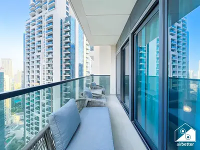 a balcony with views of a city at Skyline Elegance, Fountain View 3BR in Downtown in Dubai