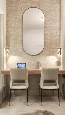 a room with a desk with a mirror and two chairs at Charming Designed Apt - RIVIERA 26 Residence - Close to downtown in Dubai