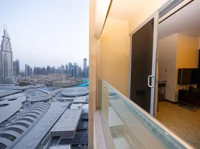 a room with a view of a city at Emaar Residenc Fashion Avenue - Sokoon in Dubai