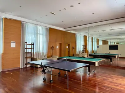 a room with two ping pong tables in it at Lux Upscale Living Walk to Dubai Mall in Dubai
