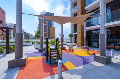 a playground in a building with a slide at Studio in Azizi Riviera in Dubai