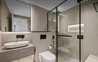 a bathroom with a shower and a toilet and a sink at Luxury Apartment near Dubai Mall & Burj Khalifa at Emaar 29 Boulevard by Simply Comfort in Dubai