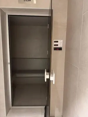an elevator door in a building with a sign on it at Star of Dubai Marina 2 Br 5 Guests in Dubai