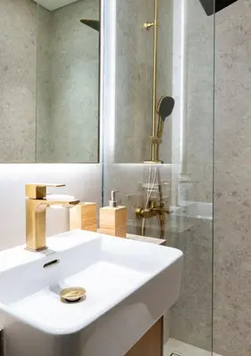 a bathroom with a white sink and a mirror at Private Pool I Sleeps 6 I Circle Mall in Dubai