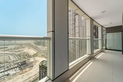 an office building with a view of a city at Stylish Stay - 1 Bedroom - High Floor in Dubai