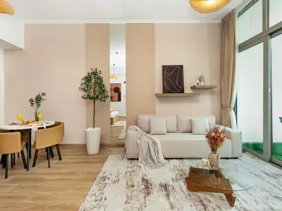 a living room with a couch and a table at Urban Dubai Marina Stay, Near Yacht Area & Beach Sleep 8 Pax in Dubai