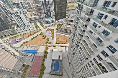 an aerial view of a city with tall buildings at Sylish Studio with Balcony Views Near Dubai Mall in Dubai