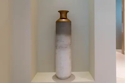 a vase sitting on a shelf in a wall at Your Hollywood-Style Hideaway -DAMAC Paramount in Dubai