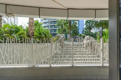 a playground in a building with a white railing at Your Hollywood-Style Hideaway -DAMAC Paramount in Dubai