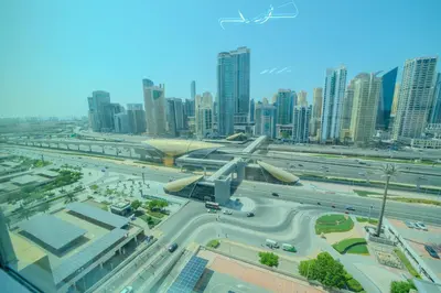 an aerial view of a city with a highway at Metrofront Stay - Walk to Iconic Dubai Spots in Dubai