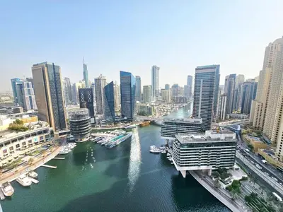 a view of a city with a river and buildings at SUNRISE HOMES - Stunning 1BR Marina View near Beach walk in Dubai
