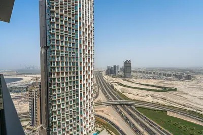 an aerial view of a tall building in a city at Relaxing 2BR in Business Bay Mins to Burj Khalifa in Dubai