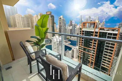 a balcony with a view of the city at LUX The JW Marina Suite 4 in Dubai