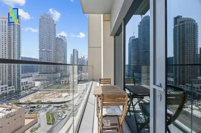 a balcony with a view of a city at The Ivory Crown 1BR Downtown Dubai in Dubai