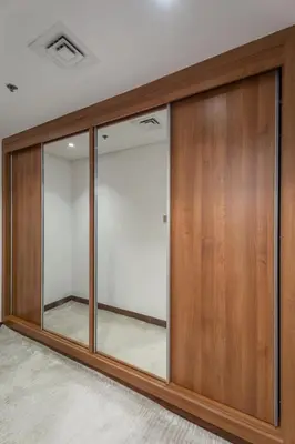 a room with glass and wood sliding doors at 83rd Floor Luxurious Penthouse Full Sea View 6 BHK in Dubai