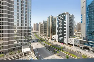 an aerial view of a city with tall buildings at Waves - Vibrant Studio, Perfect For Couples in Dubai