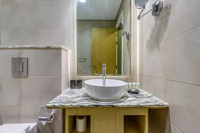 a bathroom with a large bowl sink on a counter at Paramount Towers & Residences - 1 Bedroom Apartment - Allsopp & Allsopp in Dubai
