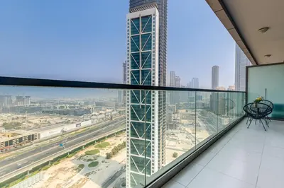 a view from the glass floor of a skyscraper at Paramount Towers & Residences - 1 Bedroom Apartment - Allsopp & Allsopp in Dubai