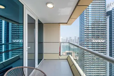 a balcony with a view of a city at Spacious 2BR Dubai Marina & City Views in Dubai