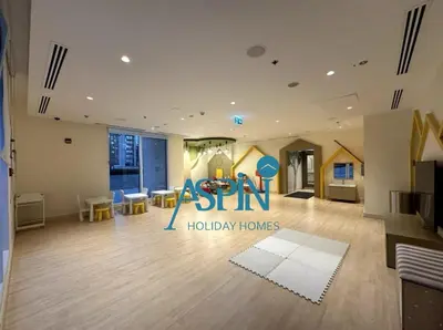 an asotin holiday homes office with a living room at Aspin 1BHK Waterfront View - Creek Horizon in Dubai