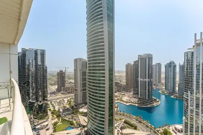 a view of a city from a skyscraper at Modern 1 Bed With Marina Views Near JBR Beach in Dubai