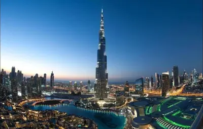 a view of a city with a tall skyscraper at Eco Space Partition Room in Green view 3 in Dubai
