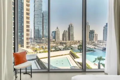 a hotel room with a view of the city at Modern Waterfront Living with Stunning Views in Dubai