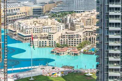 a view of a city from a skyscraper at DVH Luxe Retreats 2 Bedroom Downtown by Burj Khalifa and Dubai Mall in Dubai
