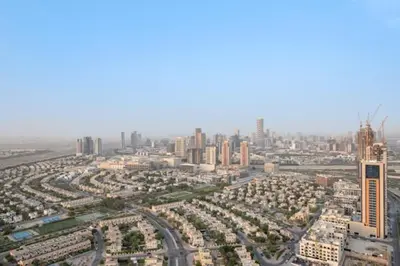 an aerial view of a large city with tall buildings at FIRST CLASS Studio Stylish , Prime Location in Dubai