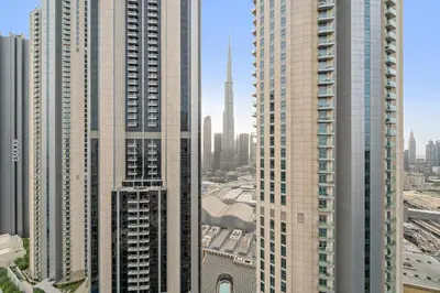 a view of some tall buildings in a city at FIRST CLASS 1BR Iconic Burj Khalifa View in Dubai
