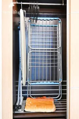 an open oven with a loaf of bread and utensils at MarvelStay - Connected to Mall & Metro - JW Marriott in Dubai