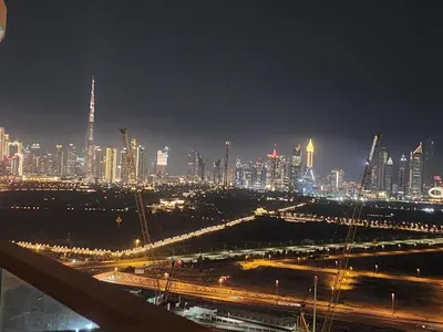 a view of a city at night with at City View Apartment very Close to Downtown and World Trade Center DIFC in Dubai