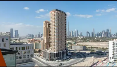 a view of a tall building in a city at City View Apartment very Close to Downtown and World Trade Center DIFC in Dubai