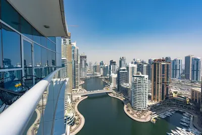 a view of a city with a river and buildings at Bright 1bhk Full Marina View in Dubai