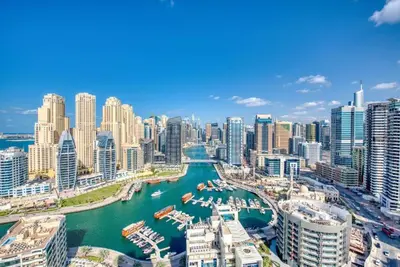 a view of a city with a harbor at Stylish 1-Bedroom Apartment in the Heart of Dubai Marina in Dubai