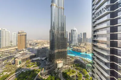 an aerial view of a city with a tall skyscraper at Maison Privee - Fabulous Apt with Sensational Burj Khalifa Views in Dubai