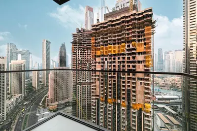 a view of a large building in a city at Luxury 4BR Burj Khalifa Dubai Mall in Dubai