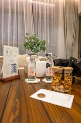 a wooden table with food items on top of it at Modern 1 bedroom with Direct Marina Access in Dubai