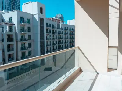 a balcony with a view of buildings at Bright & Spacious 2BR Apartment | The Greens Community in Dubai