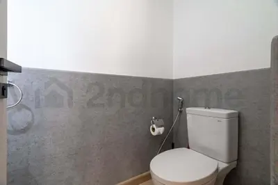 a bathroom with a white toilet in a room at Burj Khalifa View - New Furnished Unit in Downtown in Dubai