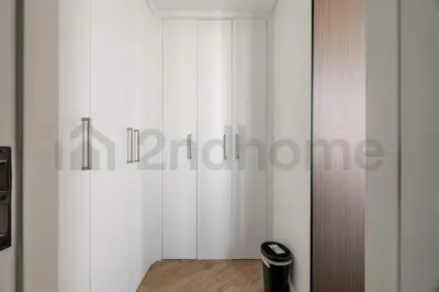 a room with white walls and a sliding door at Burj Khalifa View - New Furnished Unit in Downtown in Dubai