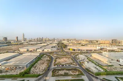 an aerial view of a city with buildings and roads at FIRST CLASS Studio Cozy Comfort in Dubai