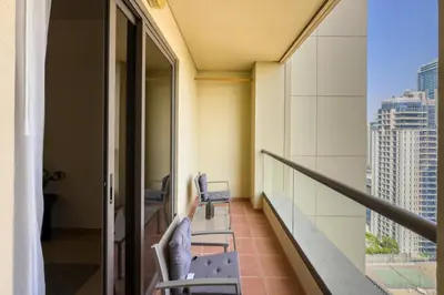 a balcony in a building with a view of a city at 2 Bedroom Apts in JBR Shams 1 by Luxaura in Dubai