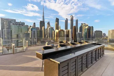 a view of the city from the roof of a building at Chic 1B by Dubai Canal Marasi Drive with Pool, Gym in Dubai
