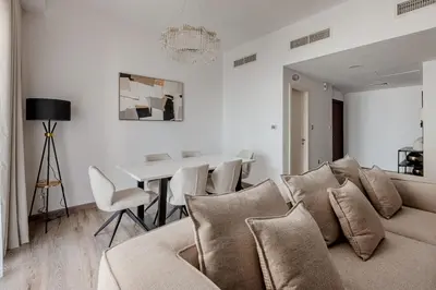a living room with a couch and a table at 2 bedroom with a full sea view ! BAHAR in Dubai