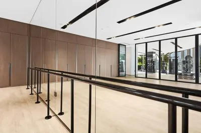 a bowling alley with black railings in a building at FIRST CLASS 1BR Burj Khalifa & Skyline Views in Dubai