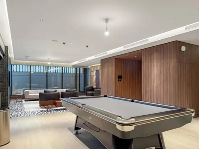 a billiard room with a pool table in it at FIRST CLASS 3BR Luxury Meets Tranquility in Dubai