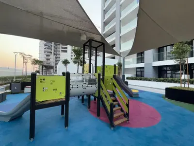 a playground in a building with a slide at Azizi 205 Fully Furnished Apartment in Dubai