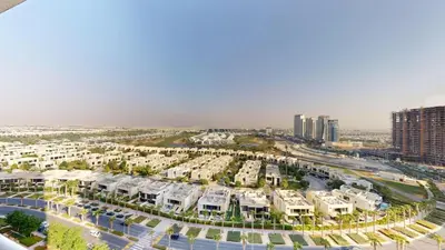 an aerial view of a city with condos at Vacationer I Luxury Studio I Scenic Golf Course & Skyline Views I Carson B Tower in Dubai Marina